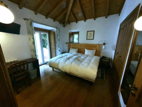 Postel nebo postele na pokoji v ubytování Hotel Sintra Jardim
