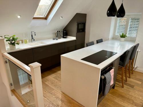 a kitchen with a sink and a counter top at Lilimae Barn in Ashbourne