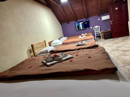 Postel nebo postele na pokoji v ubytování Hotel Atika