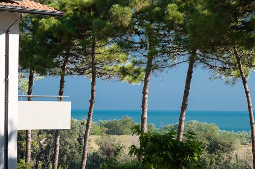 a view of the ocean from the balcony of a house at Bea&Berto - B&B - in Trebbiantico