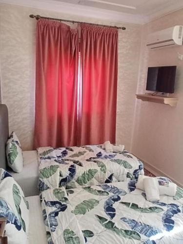 Hotel Tidinitにあるベッド