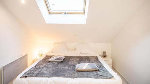 Кровать или кровати в номере Smart Confort 5 - Appartement confort et stylé