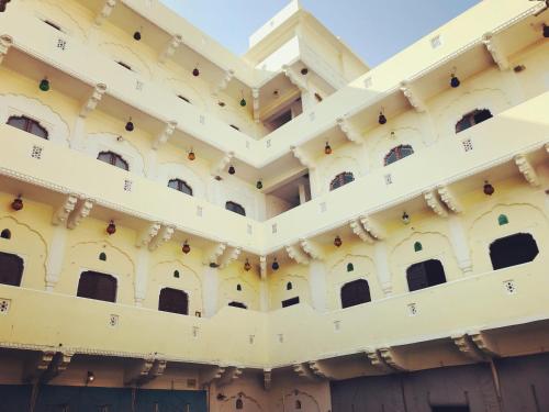 a view of the facade of a building at Saba Haveli in Jaipur