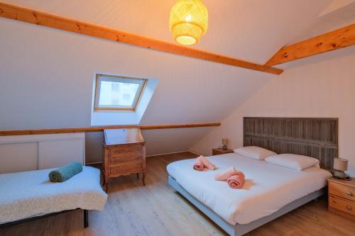 Postel nebo postele na pokoji v ubytování La Balnéaire - à 50m de la plage