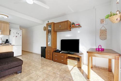TV a/nebo společenská místnost v ubytování Playa de Chilches
