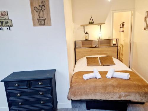 Postel nebo postele na pokoji v ubytování Le Flambart