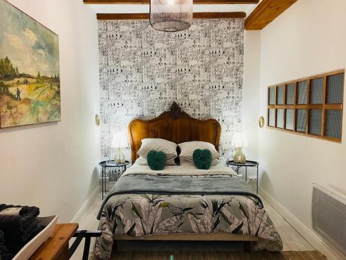 Llit o llits en una habitació de Maison Petit Arago avec roof terrace et parking privé