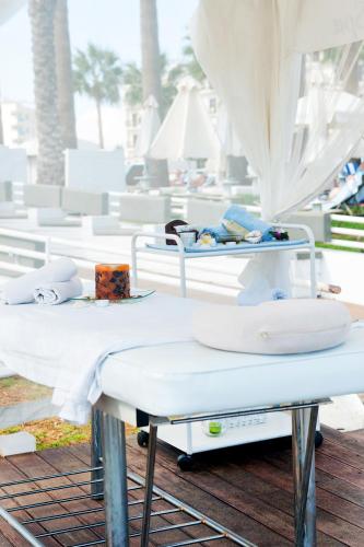 a couple of beds sitting on a table at Vrissiana Boutique Beach Hotel in Protaras