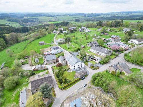 an aerial view of a small village with a road at De Patuljak in Houffalize
