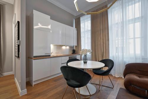 Cuisine ou kitchenette dans l'établissement Garnisongasse - Luxurious Apartment close to the city centre