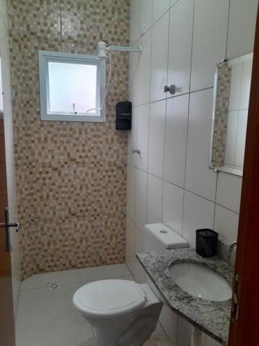 Phòng tắm tại CASA NA PRAIA GRANDE pé na areia