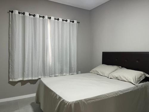 Cama o camas de una habitación en Apartamento Fátima PARA FAMÍLIA