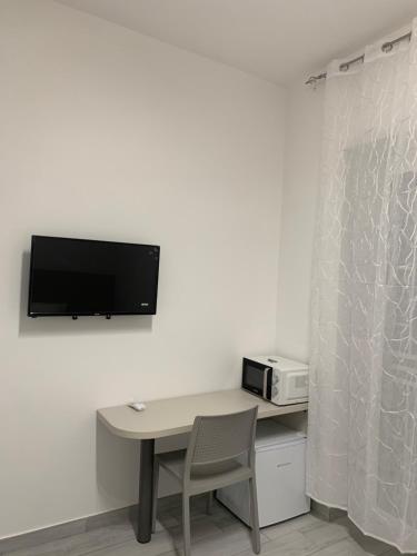 Cavallerizza homeにあるテレビまたはエンターテインメントセンター