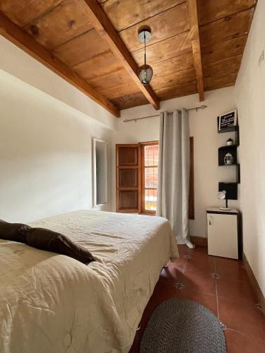 Giường trong phòng chung tại Zoola Suites Antigua
