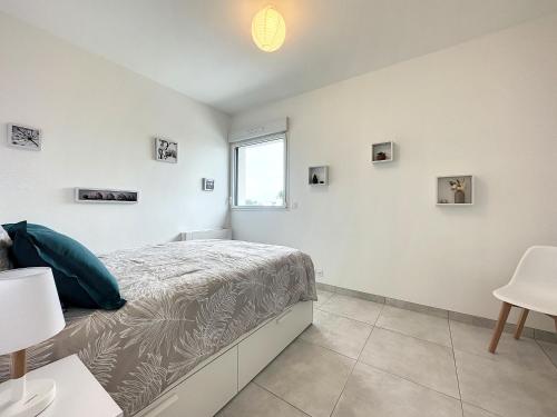 Postel nebo postele na pokoji v ubytování Le 121 - Appartement 101