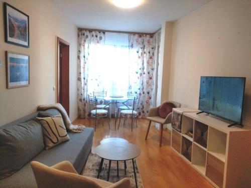 TV a/nebo společenská místnost v ubytování TO FOUR+2 PREDELA 1