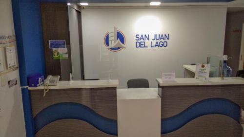 a room with a san juanillaillael lab sign on a wall at San Juan Del Lago in Pereira