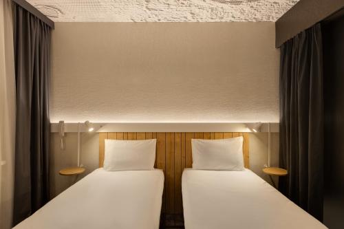 ibis Kyiv Beresteiskaにあるベッド