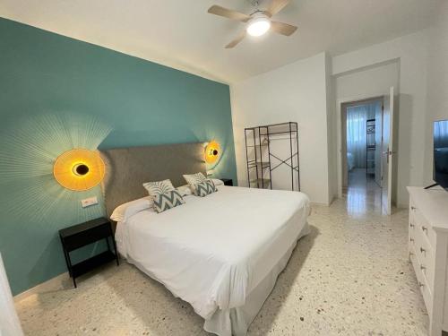 Ένα ή περισσότερα κρεβάτια σε δωμάτιο στο Sanlúcar Urban Apartment