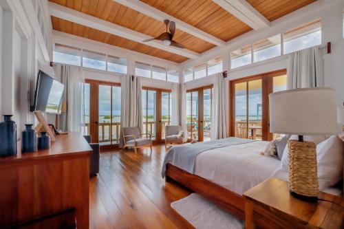 Ένα ή περισσότερα κρεβάτια σε δωμάτιο στο Aruna Resort & Villas