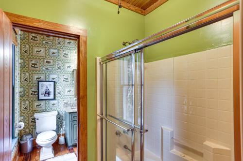a bathroom with a toilet and a glass shower at Lakefront Custom-Built Mentone Home Game Room! in Mentone