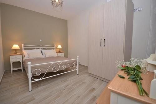 Katil atau katil-katil dalam bilik di Moutros Cozy Home