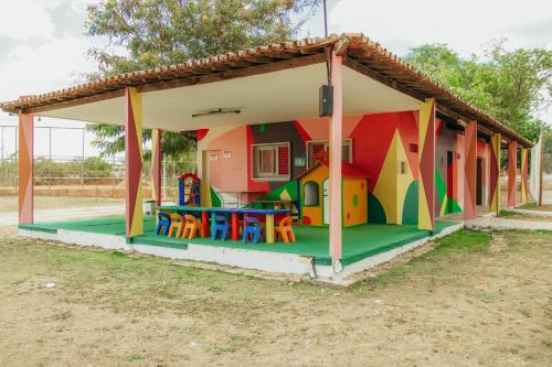 a play house with a play table and chairs at Thermas Hotel Mossoró in Mossoró
