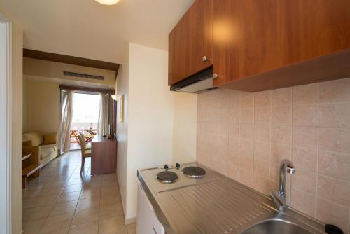 Kuchyň nebo kuchyňský kout v ubytování Summertime Inn