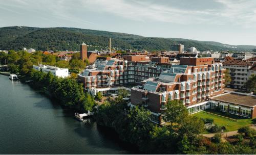 an aerial view of a city next to a river at Heidelberg Marriott Hotel in Heidelberg