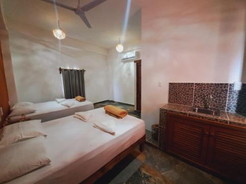 Postel nebo postele na pokoji v ubytování Hotel Yaan Chaca