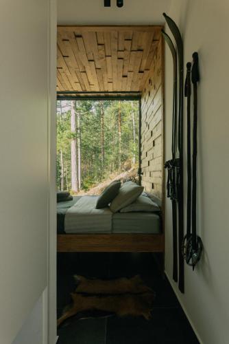 Postel nebo postele na pokoji v ubytování Tara Cabins Pure Nature