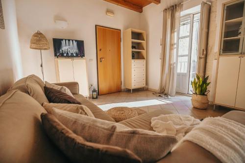 Televisyen dan/atau pusat hiburan di Anacreonte Ortigia Apartment