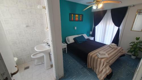 Koupelna v ubytování Alquileres Necochea Ok