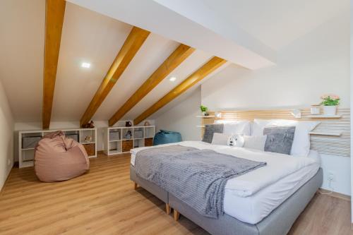 Postel nebo postele na pokoji v ubytování Apartmány Vista Klínovec