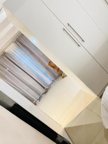 Ένα ή περισσότερα κρεβάτια σε δωμάτιο στο EThembeni Guesthouse