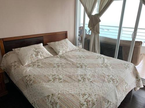 Ένα ή περισσότερα κρεβάτια σε δωμάτιο στο Departamento Vista al mar