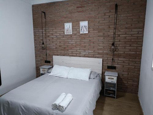 Posteľ alebo postele v izbe v ubytovaní Apartamento familiar