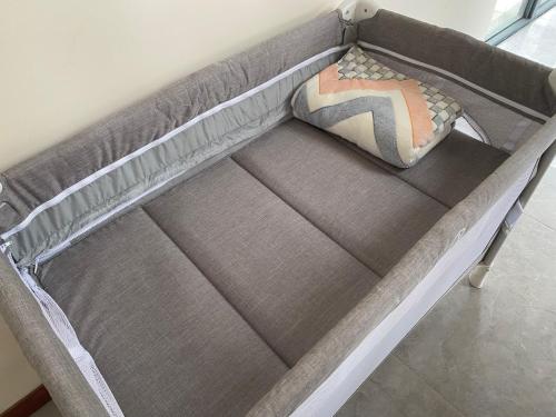 a bed with a pillow on top of it at coral coast FIJI in Sigatoka