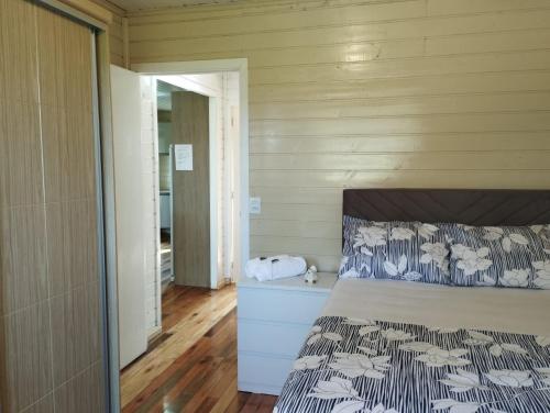 Posteľ alebo postele v izbe v ubytovaní Recanto do lago