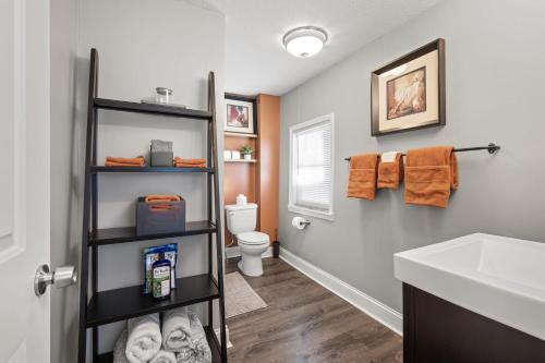 a bathroom with a sink and a toilet at 3BR free parking free Wi-Fi near dntown St Paul in Saint Paul