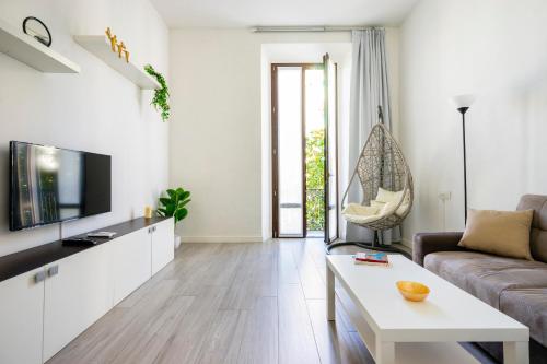 TV a/nebo společenská místnost v ubytování "Le Cure Home" Appartamento con 2 Camere Matrimoniali, Terrazzo