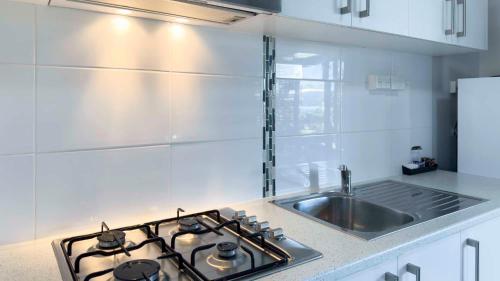 Кухня или мини-кухня в Ingenia Holidays Hervey Bay
