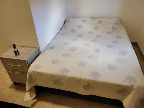 מיטה או מיטות בחדר ב-ALQUILERES MARLUZ