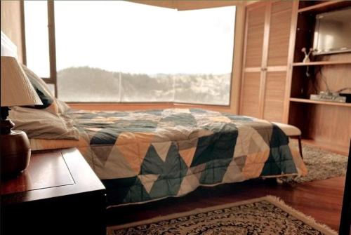 Cama ou camas em um quarto em Suite Lujo Panorámica en Guápulo
