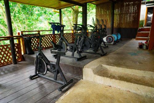 a row of bikes parked on a wooden deck at Sierra Minca SEDE II in Arimaca
