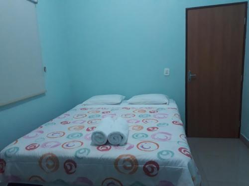 Кровать или кровати в номере Casa do Beto