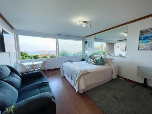 Una cama o camas en una habitación de Hermoso Depto, 1Linea Roca Mar Sector Costa Brava