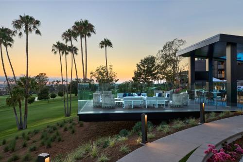 a rendering of a house with palm trees at VEA Newport Beach, a Marriott Resort & Spa in Newport Beach