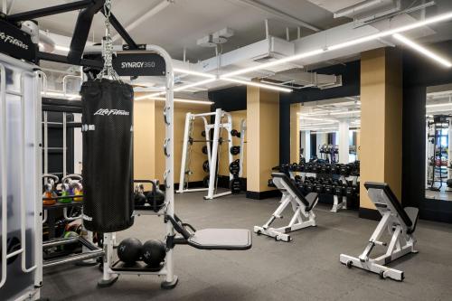 a gym with a punching bag and weights at VEA Newport Beach, a Marriott Resort & Spa in Newport Beach