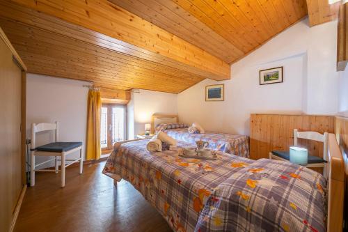 Postel nebo postele na pokoji v ubytování Appartamento Miorelli